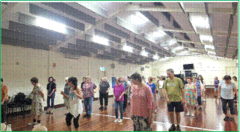 A group of people in a room

AI-generated content may be incorrect.